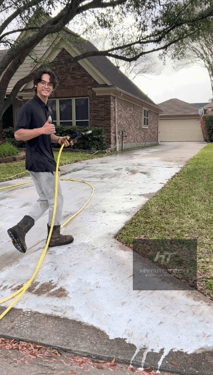 Pressure Washing 3 HydroTech Spraying Chemicals on Driveway Houston TX